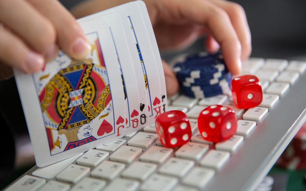 FILE PHOTO: Keyboard, cards, chips, dice are seen in this illustration picture, June 5, 2020. REUTERS/Dado Ruvic/Illustration/File Photo